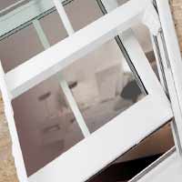 White Vertical Sliding Window